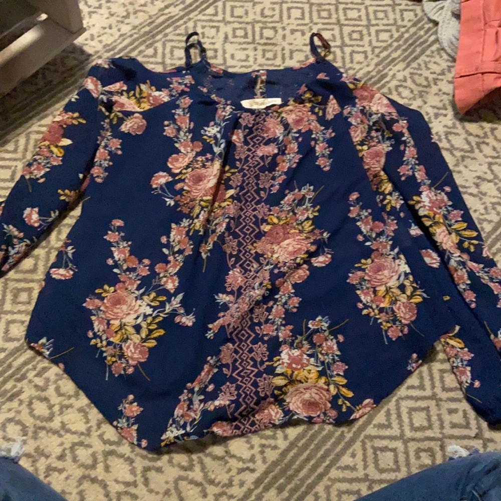 navy blue top with multi colored flowers on it